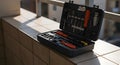 Tools Set with Screwdrivers and Bits on Balcony Tile Surface Royalty Free Stock Photo