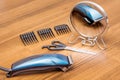 Tools on the table in the hairdressing salon: trimmer, nozzles, Royalty Free Stock Photo