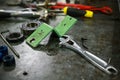 Tools on table in workshop or the garage for repair the machine with spare part of the machine. Technician work on the workshop Royalty Free Stock Photo
