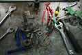Tools on table in workshop or the garage for repair the machine with spare part of the machine. Technician work on the workshop Royalty Free Stock Photo