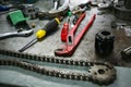 Tools on table in workshop or the garage for repair the machine with spare part of the machine. Technician work on the workshop Royalty Free Stock Photo