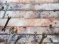 Tools for threaded connections and fasteners. Wrenches, bolts and nuts on wooden boards. Space for text. Background for business