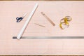 Tools to draw a clothing pattern on graph paper Royalty Free Stock Photo