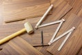 Tools to laying laminate on the wooden floor