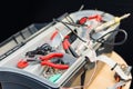 Tools in a toolbox for electronic repairs to computers and laptops