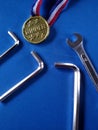 Tools and winner medal Royalty Free Stock Photo
