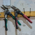 Tools in the workshop drills, screwdrivers, scissors on the metal Royalty Free Stock Photo