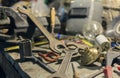 Tools in workshop, Retro stylized old tools on iron table Royalty Free Stock Photo