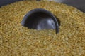 Half rising steel bowl in Toor Dal, Indian pigeon peas Dal Royalty Free Stock Photo