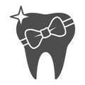 Tooth with bow solid icon, International dentist day concept, Healed tooth sign on white background, tooth gift icon in