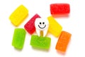 Tooth character with a bunch of jelly candies