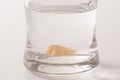 Tooth decay in a glass of water Royalty Free Stock Photo