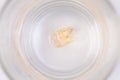 Tooth decay in a glass of water Royalty Free Stock Photo