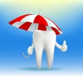 Tooth holding an umbrella Royalty Free Stock Photo