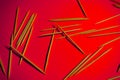 Tooth Pick Stick Casual Design On Red Colour Background Wallpaper Image Beautiful Abstract Scenario Royalty Free Stock Photo