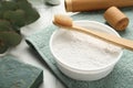 Tooth powder, brush and soap on white table, closeup Royalty Free Stock Photo