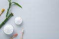 Tooth powder, brushes and bamboo stem on white background, flat lay. Space for text Royalty Free Stock Photo