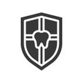 Tooth on shield, dental related solid icon