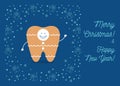 Tooth is wearing costume of cookie string celebrate Christmas and New Year. Royalty Free Stock Photo