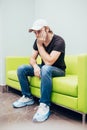 Toothache - A middle-aged Caucasian patient holding his cheek with a bad tooth Royalty Free Stock Photo