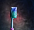 Toothbrush background of a dark concrete wall. Care of teeth Royalty Free Stock Photo