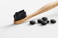 Toothbrush with black charcoal toothpaste