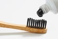 Toothbrush with black charcoal toothpaste Royalty Free Stock Photo