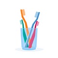 Toothbrush and cup family pink blue green orange set Royalty Free Stock Photo