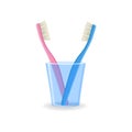 Toothbrush and cup icon set family pink blue set in a glass cup. Royalty Free Stock Photo