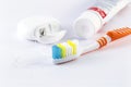 Toothbrush, dental floss and toothpaste on white background Royalty Free Stock Photo