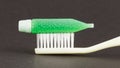 Toothbrush and green toothpaste isolated Royalty Free Stock Photo