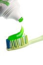 Toothbrush, green toothpaste and tube isolated Royalty Free Stock Photo