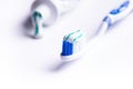 Toothbrush isolated on a white background with reflection and toothpaste. Blue plastic toothbrush. Concept of dental medicine. Royalty Free Stock Photo
