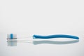 Toothbrush lying on glass shelf