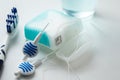 Toothbrush, mouthwash, floss and blue interdental brushes as equipment for daily dental care, prevention and hygiene Royalty Free Stock Photo