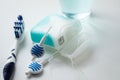 Toothbrush, mouthwash, floss and blue interdental brushes as equipment for daily dental care, prevention and hygiene Royalty Free Stock Photo