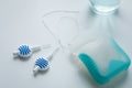 Toothbrush, mouthwash, floss and blue interdental brushes as equipment for daily dental care, prevention and hygiene Royalty Free Stock Photo