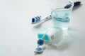 Toothbrush, mouthwash, floss and blue interdental brushes as equipment for daily dental care, prevention and hygiene Royalty Free Stock Photo