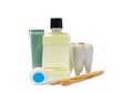 Toothbrush, mouthwash, floss, tongue cleaner and toothpaste isolated on white background.