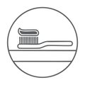 Toothbrush and paste in circle icon. A simple line drawing of a toothbrush with toothpaste on top in a circular frame Royalty Free Stock Photo