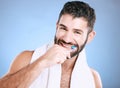 Toothbrush, portrait and man brushing teeth in studio for dental wellness, healthy smile and mouth. Happy male model Royalty Free Stock Photo