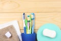 Toothbrush tooth-brush with bath towel on wooden table. top view with copy space Royalty Free Stock Photo