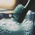 Toothbrush toothpaste bath glass closeup morning