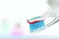 Toothbrush and toothpaste on blurred background. care for the oral cavity and teet