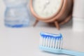 Toothbrush and toothpaste on blurred background Royalty Free Stock Photo