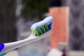 Toothbrush and toothpaste on blurred background Royalty Free Stock Photo