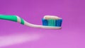 Toothbrush with toothpaste on blurred background Royalty Free Stock Photo