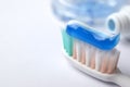 Toothbrush and toothpaste on blurred background Royalty Free Stock Photo