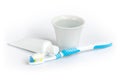 Toothbrush, toothpaste and a cup of water. Royalty Free Stock Photo