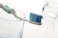 Toothbrush with toothpaste with glass Royalty Free Stock Photo